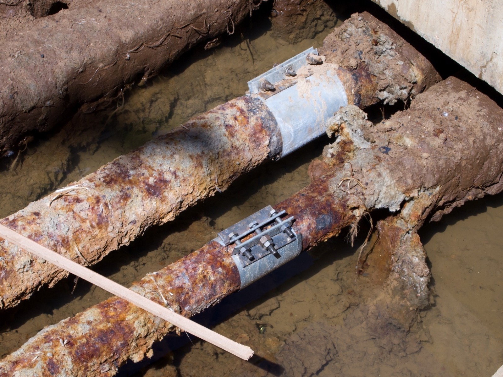 protect screw pile in corrosive soils